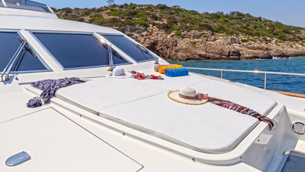 Guest sunbathing area on the foredeck of luxury motor yacht Efmaria