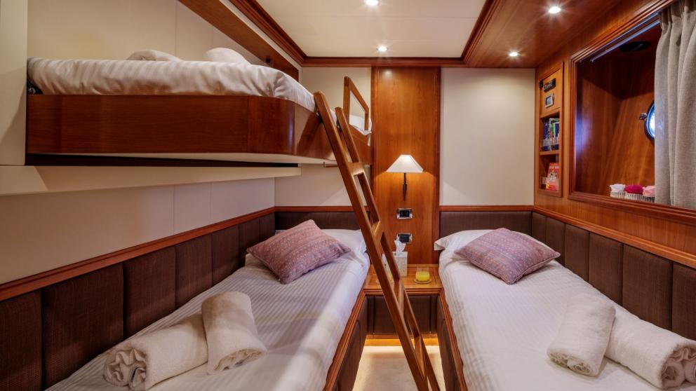 Three-person guest cabin of the luxury motor yacht Freedom