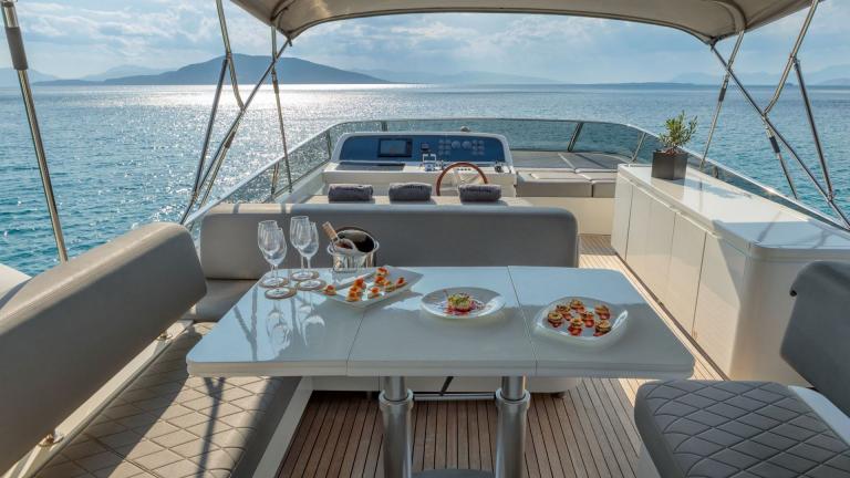 Luxury motor yacht Freedom's flybridge dining table