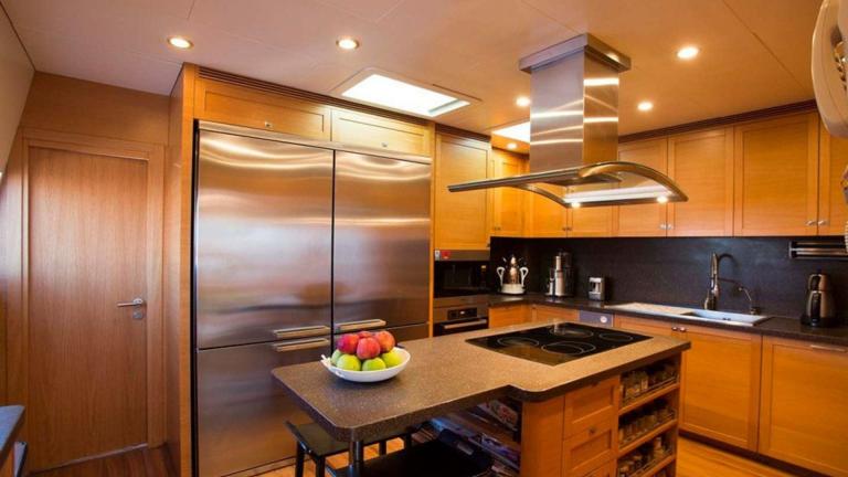 Spacious kitchen on the luxury motor yacht Panfeliss