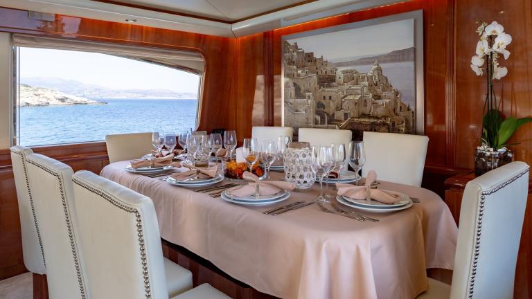 Luxury motor yacht Efmaria's saloon dining table